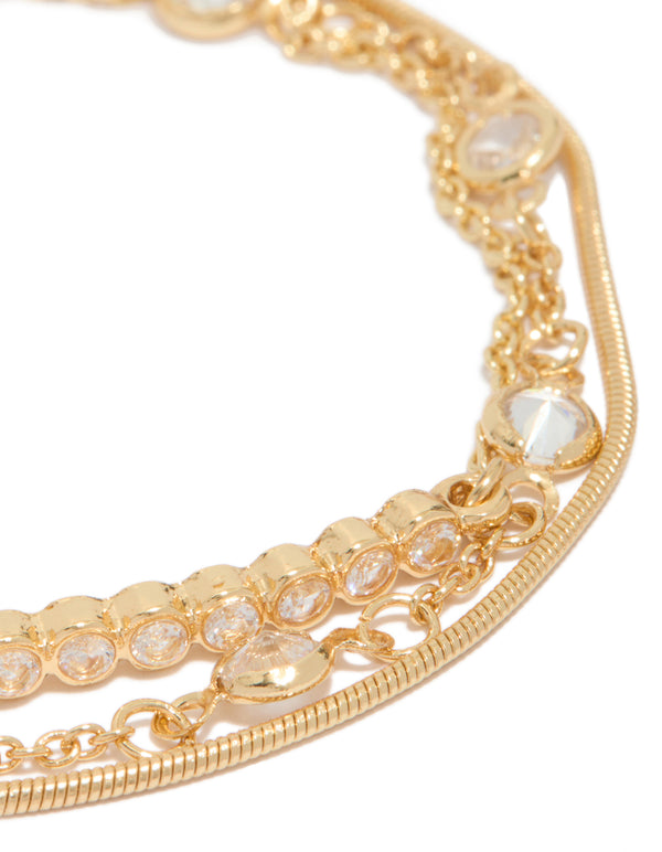 Showcasing gold plated cubic zirconia bezel stone bracelets in a 3-pack close up view