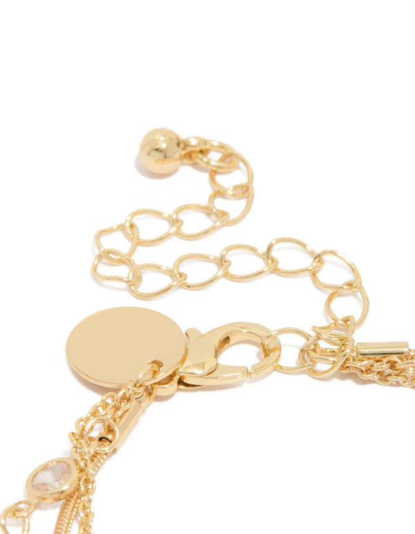 Designed with gold plated cubic zirconia bezel stone bracelets in a 3-pack closure detail view