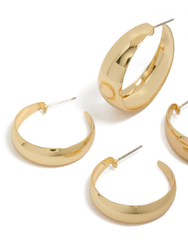 Crafted from gold plated material, medium hoop earrings in a 2-pack close up view