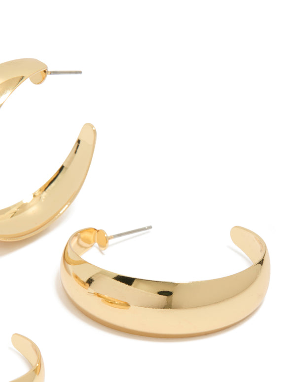 Showcasing gold plated medium hoop earrings in a 2-pack post detail view