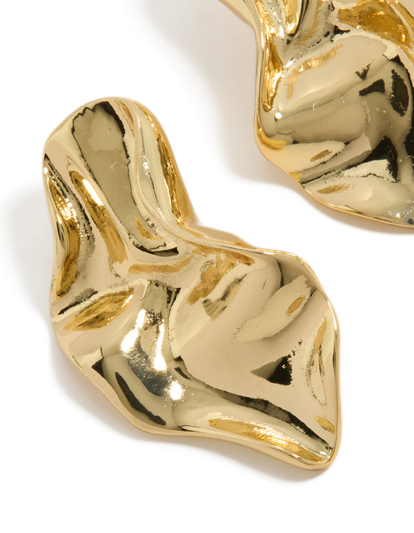 Showcasing gold plated wavy organic drop stud earrings with sculptural texture close up view