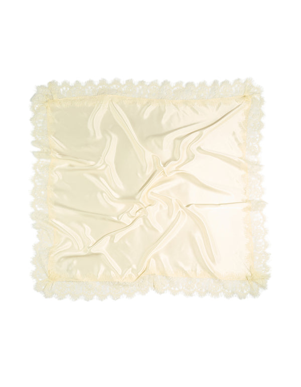 Showcasing a solid cream satin long scarf with lace edge front view
