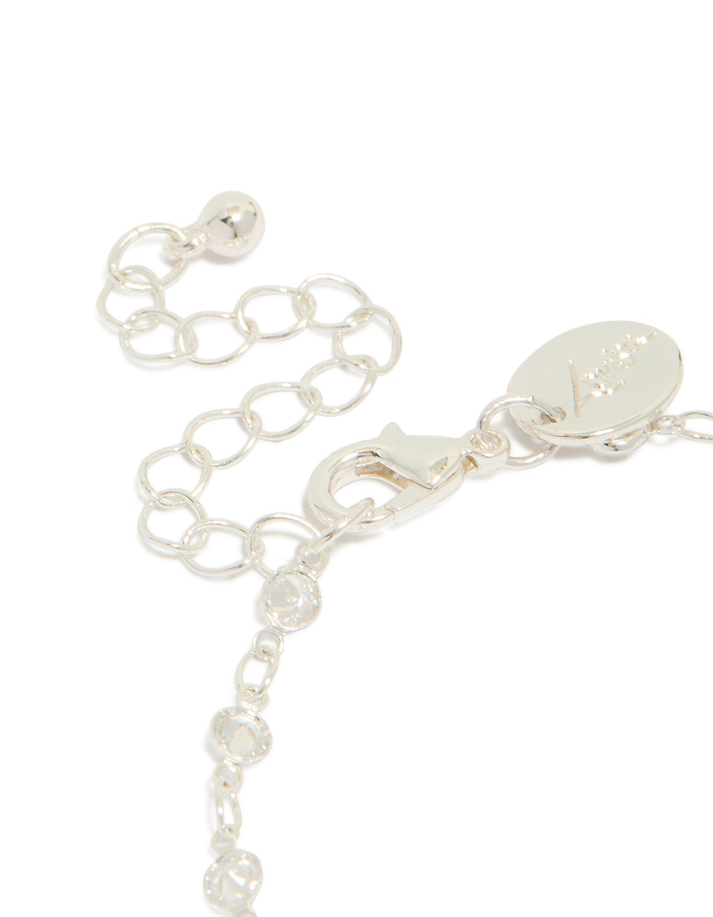 Highlighting a silver plated cubic zirconia round dainty chain bracelet closure detail view