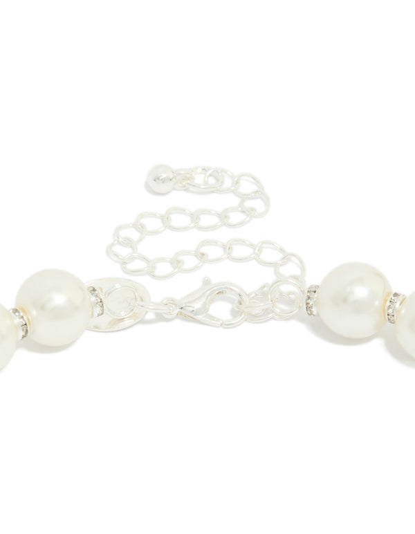 Featuring a silver plated pearl and diamante beaded necklace clasp detail view