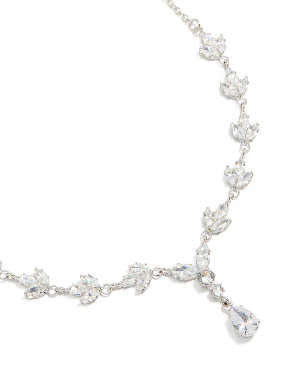 Showcasing a silver plated cubic zirconia marquise vine Y-necklace with floral leaf design in statement style close up view