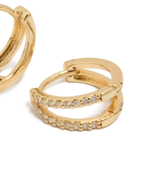 Highlighting small double layered cubic zirconia earrings with huggie closure post detail view
