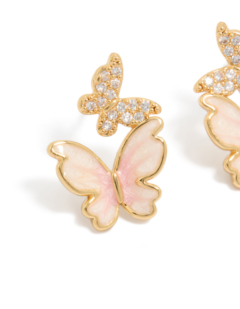 Elegant small statement butterfly stud earrings in gold plated featuring pink enamel and cubic zirconia close up view