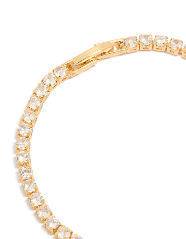 Designed with gold plated cubic zirconia mixed charm tennis bracelet featuring butterfly and heart charms closure detail view