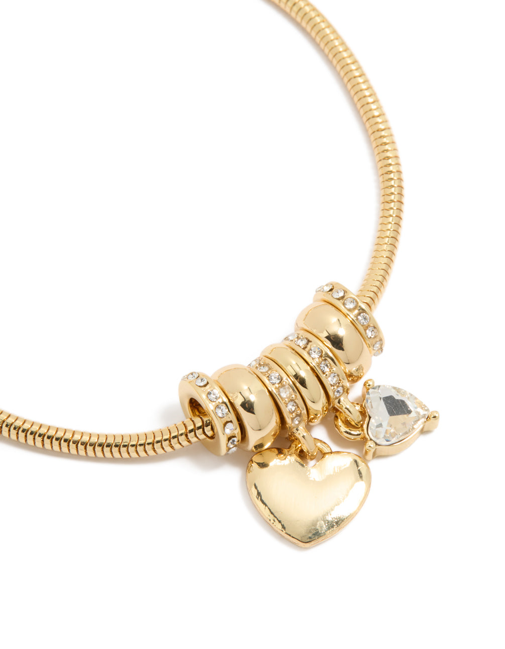 Presenting a gold plated cubic zirconia chunky heart charm toggle bracelet design close up view