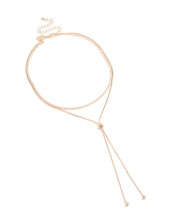 Presenting a rose gold plated cubic zirconia cup chain and snake layered Y-necklace with crystal accents front view