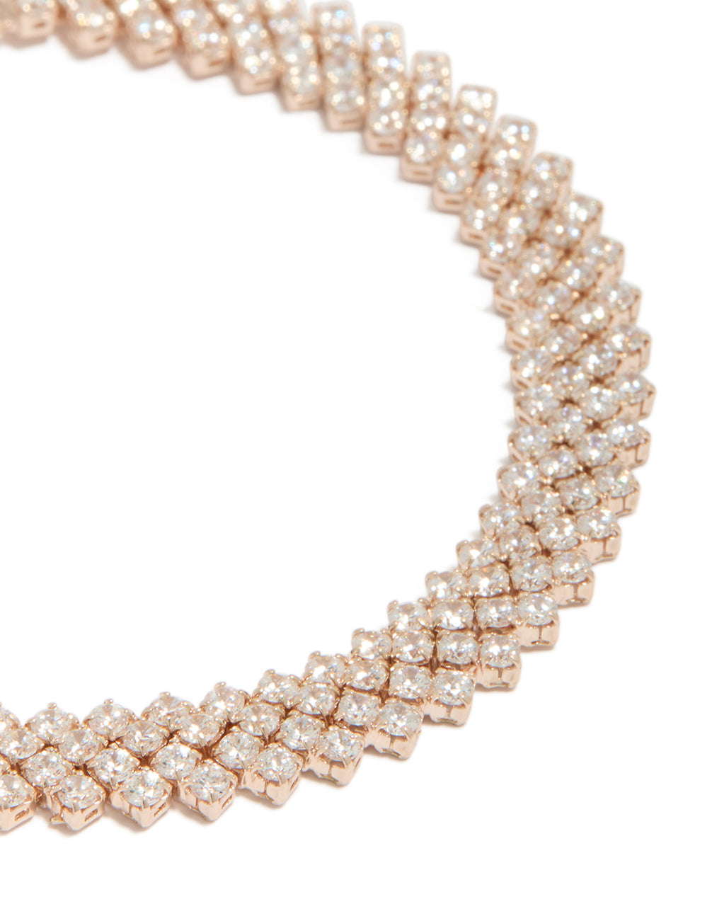 Detailed rose gold plated cubic zirconia round diagonal tennis bracelet close up view
