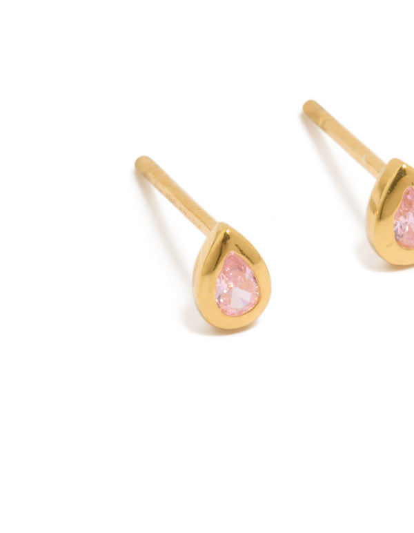 Showcasing gold plated sterling silver cubic zirconia teardrop stud earrings with light pink stones close up view