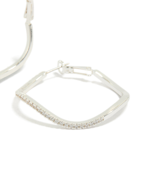 Showcasing silver diamante wavy thin hoop earrings post detail view