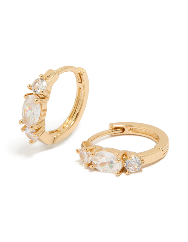 Showcasing dainty huggie earrings crafted from cubic zirconia in gold front view