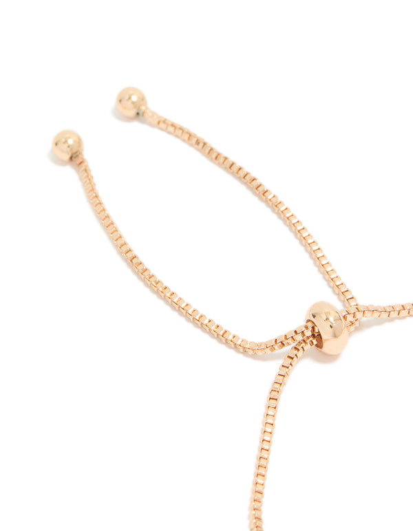 Elegantly crafted gold pink and green mismatched cubic zirconia toggle bracelet showcasing adjustable closure detail view