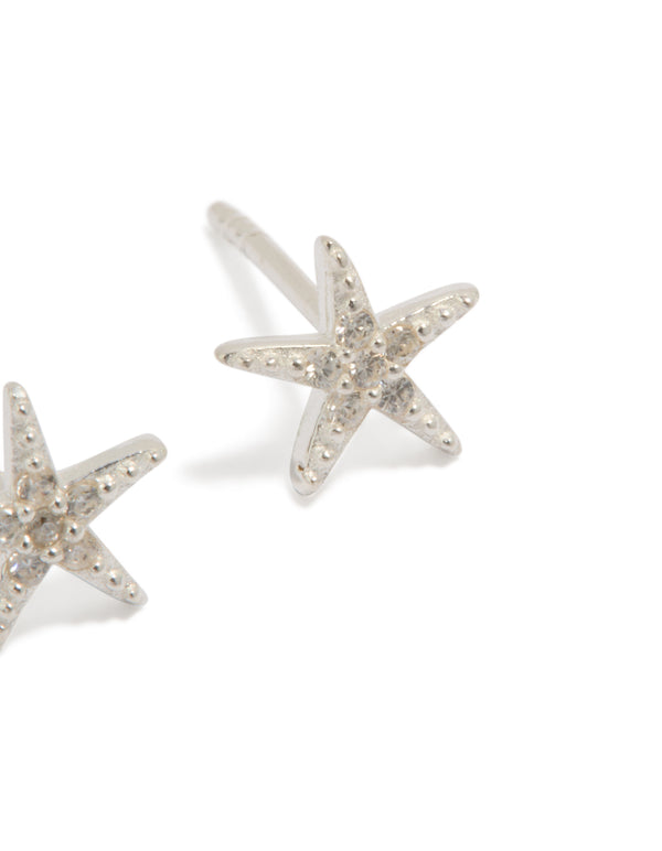 Showcasing dainty sterling silver cubic zirconia starfish earrings with ocean-inspired design post detail view