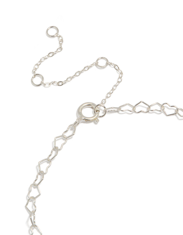 Designed with sterling silver heart links, this bracelet displays a closure detail view