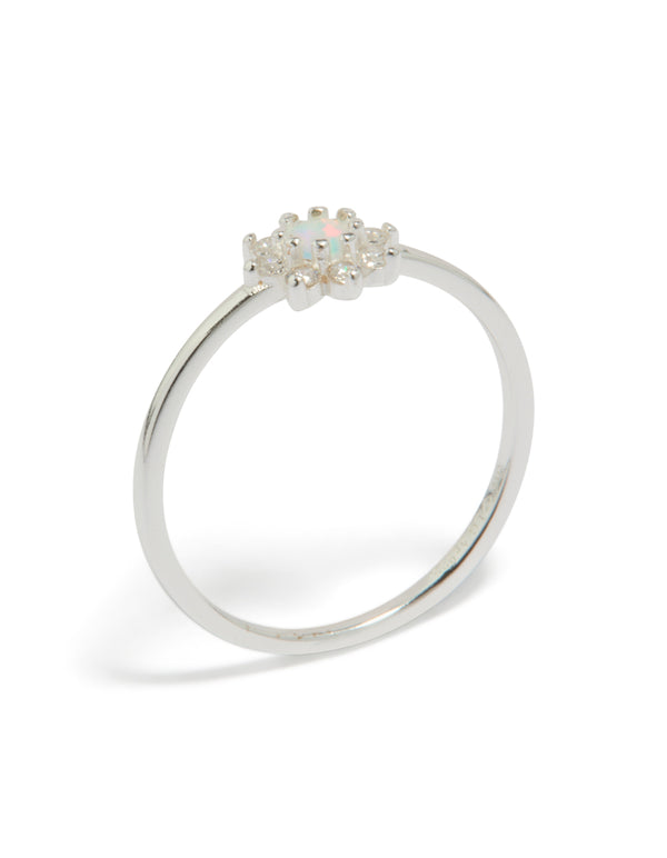 Beautifully crafted sterling silver cubic zirconia faux opal star ring with celestial design in white and ivory front view