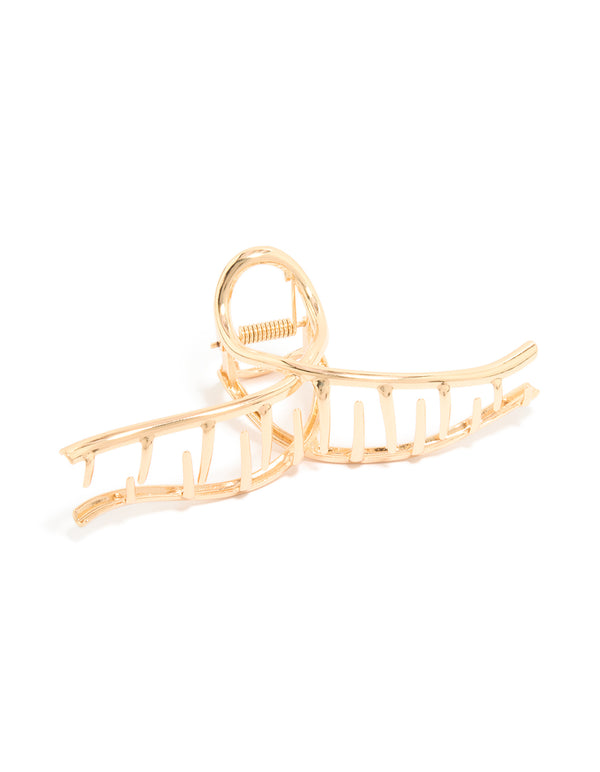 Featuring a gold wavy claw clip front view