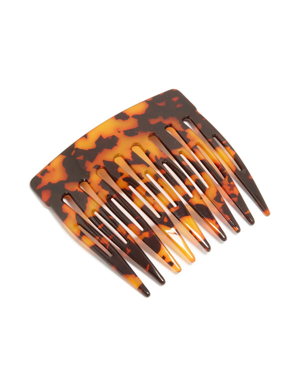 Featuring a tortoiseshell acrylic basic large hair comb in chocolate, orange, and saddle brown front view