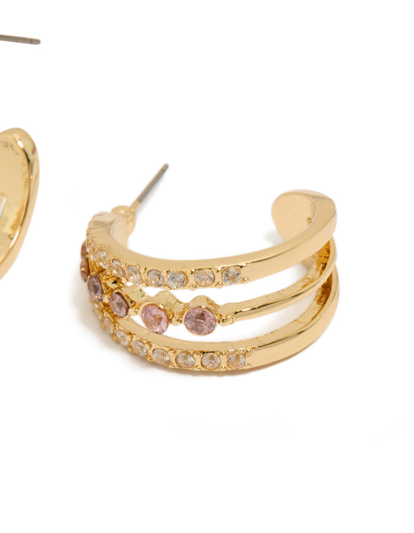 Highlighting gold plated cubic zirconia triple hoop medium earrings with detailed craftsmanship and post detail view