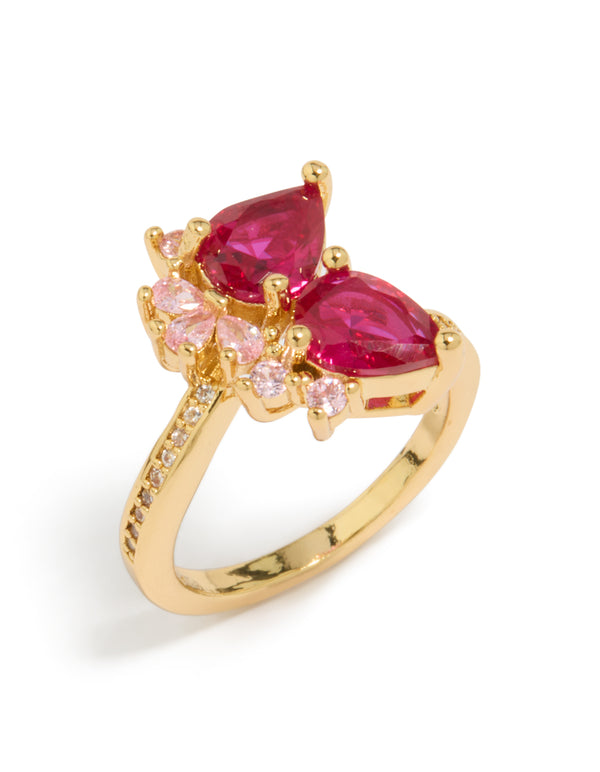 Elegant gold plated ring featuring double red pear cut cubic zirconia in statement design front view