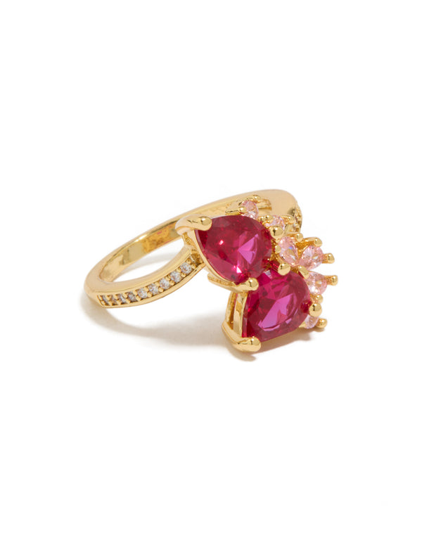 Stunning gold plated ring with double red pear cut cubic zirconia and statement design side detail view