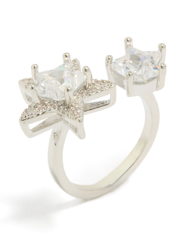 Crafted from silver, this cubic zirconia statement ring displays celestial star design with clear accents side detail view