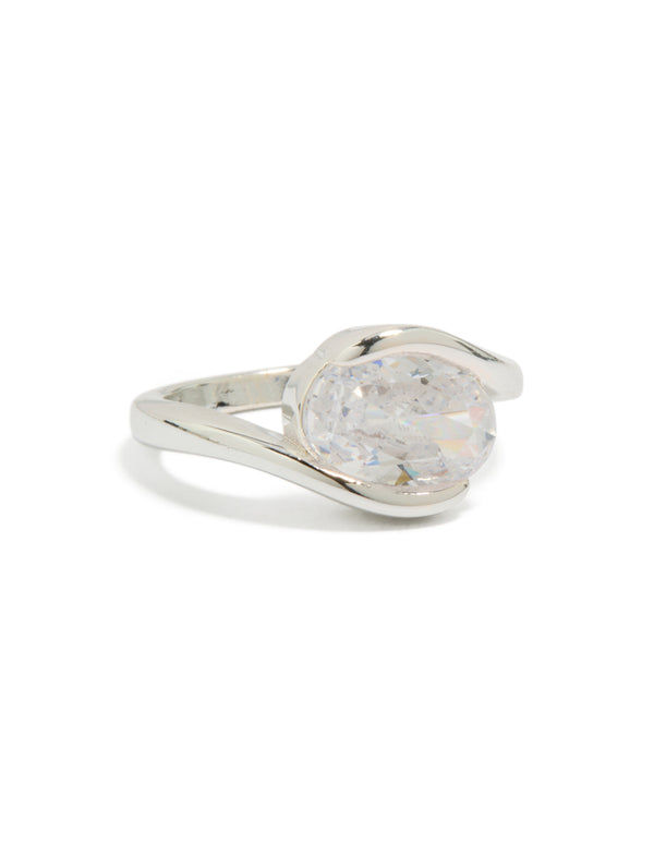Showcasing a silver plated cubic zirconia large round swivel ring with statement styling side detail view