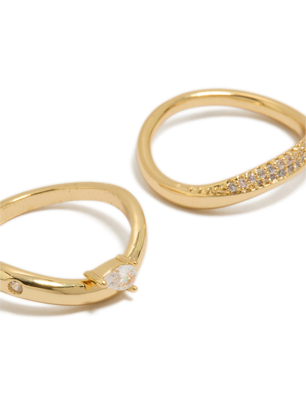 Showcasing gold plated cubic zirconia pave stacking rings in a 2-pack with pear cut crystal stones and dainty design close up view