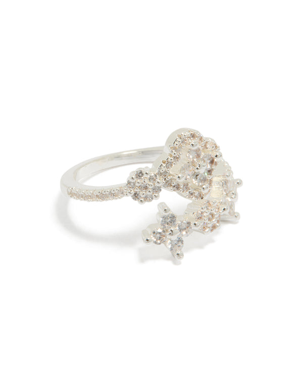 Showcasing a silver plated dainty cubic zirconia floral wrap ring in clear front view