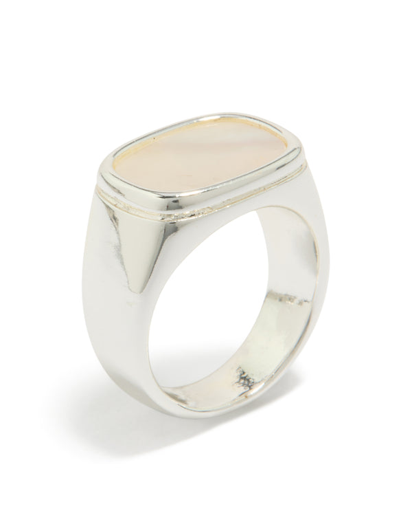 Featuring waterproof stainless steel with shell, this square statement signet ring in silver and clear side detail view