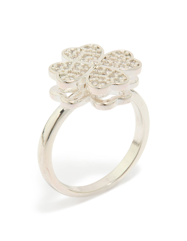 This waterproof stainless steel spinning clover ring features floral and heart design with cubic zirconia in silver and clear side detail view