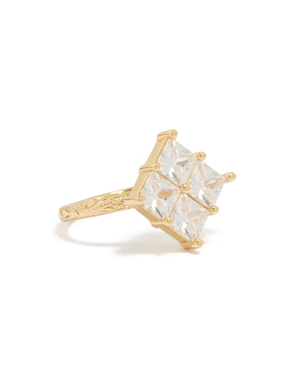 Showcasing a statement ring crafted from gold plated cubic zirconia with textured band side detail view
