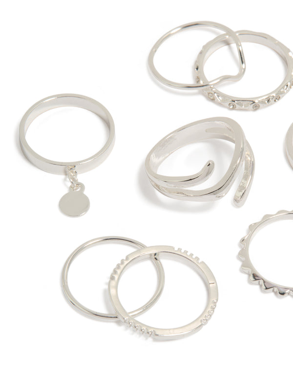 Featuring mixed swirl stacking rings 8-pack with charm disc accents in silver close up view