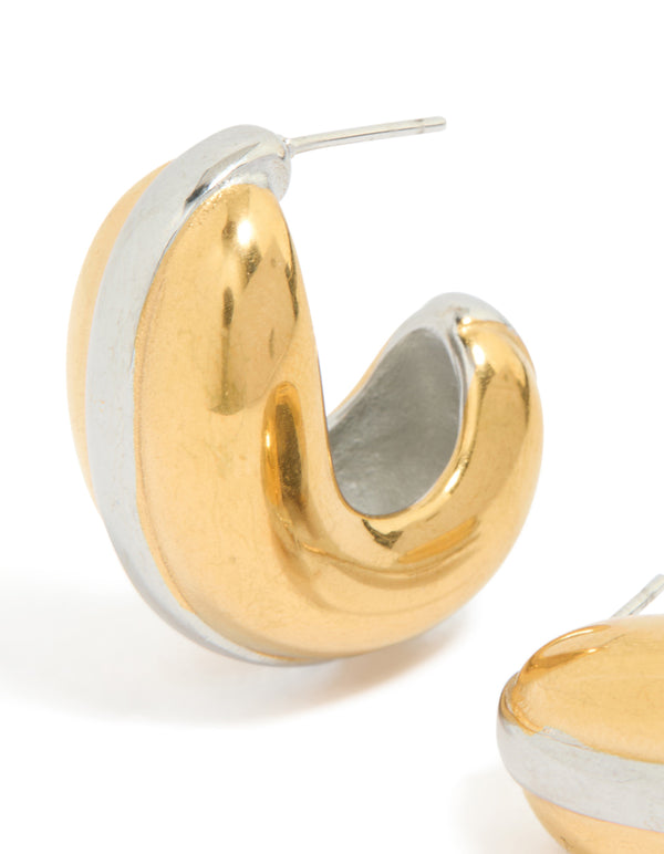 Featuring waterproof mixed plated stainless steel hoop earrings in silver and gold close up view