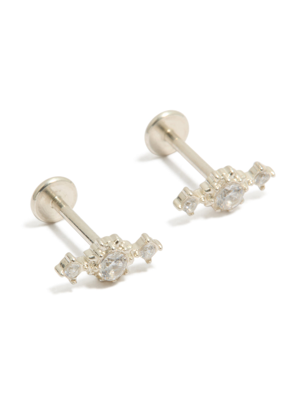 Showcasing waterproof textured trio flat back studs crafted from stainless steel featuring cubic zirconia in silver and clear front view