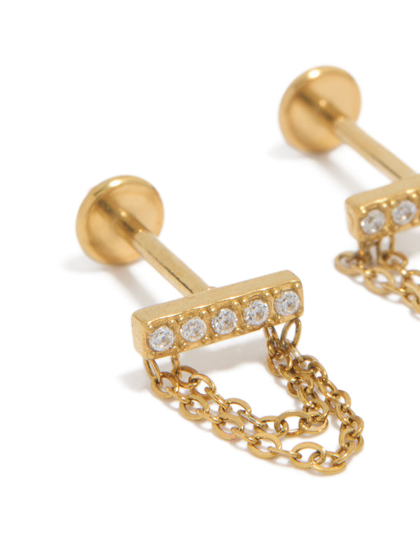 Featuring bar studs with cubic zirconia crafted from waterproof stainless steel in gold plated finish and flat back closure close up view