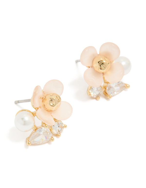 Discover gold plated cubic zirconia and pink acrylic flower stud earrings featuring pear cut crystal and pearl in white front view