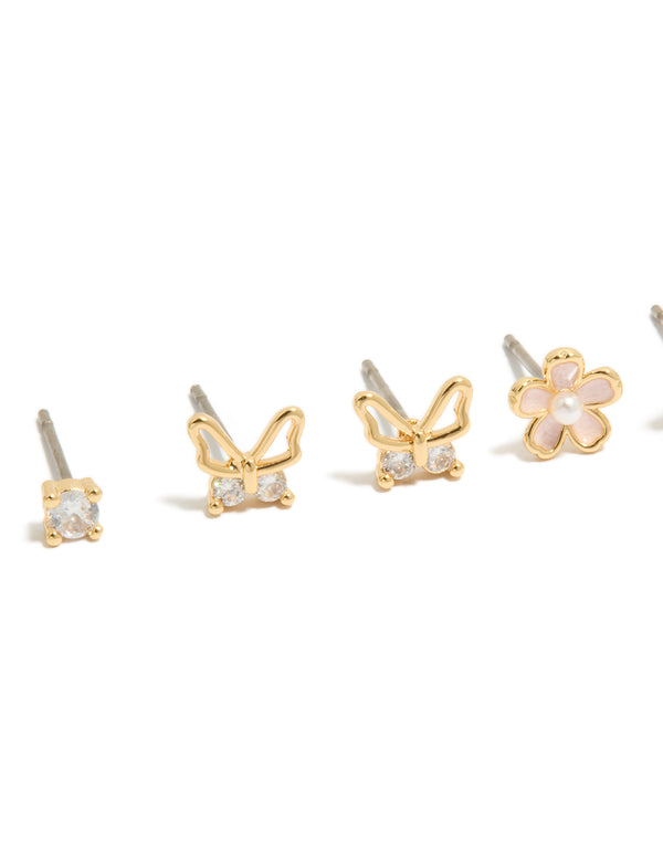 Featuring gold plated cubic zirconia enamel butterfly and flower earrings in a 3-pack, crystal pearl accents, and stud closure close up view