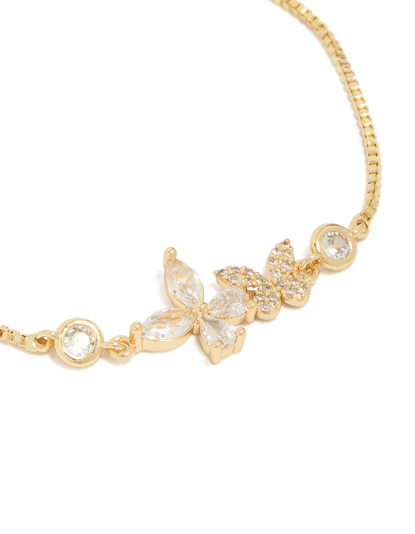 Showcasing gold plated butterfly bracelet with cubic zirconia stones in dainty style close up view