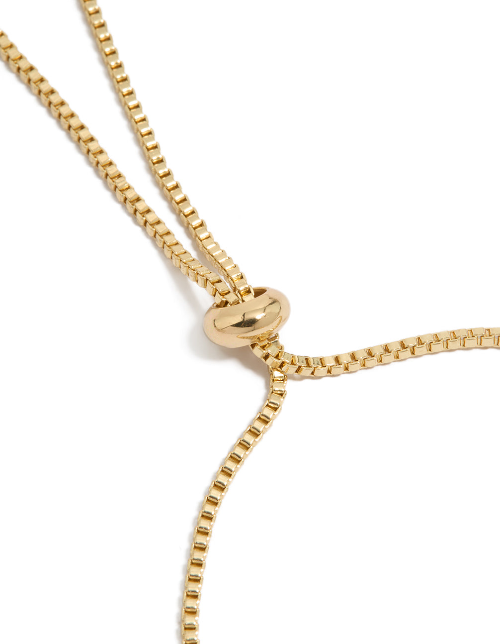 Refined gold plated toggle bracelet featuring floral cubic zirconia charms and pearl rondell accents closure detail view