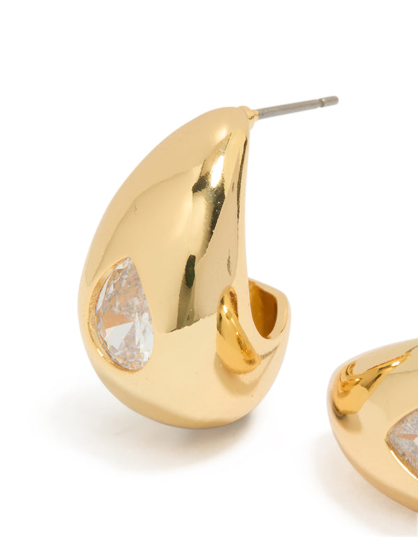 Featuring gold plated cubic zirconia teardrop hoop earrings with post detail close up view