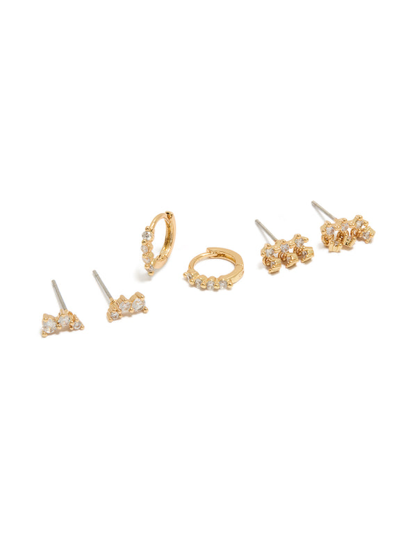 Showcasing dainty gold plated cubic zirconia trio studs and huggie earrings in a 3-pack front view