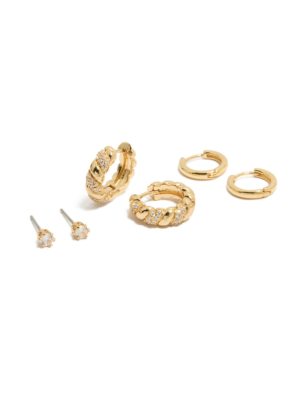 Showcasing gold plated mini twist huggie and stud earrings featuring cubic zirconia crystals in a 3-pack set front view