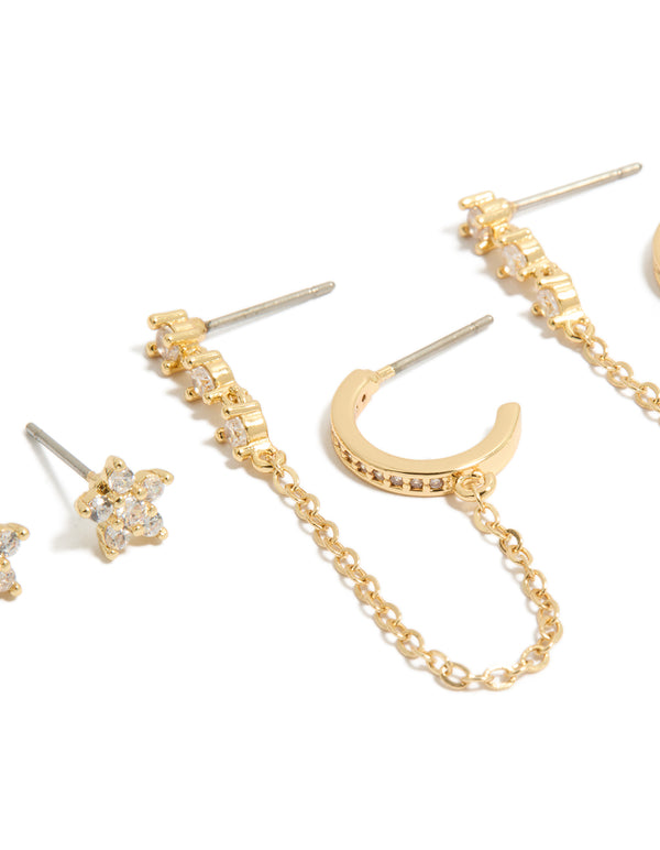 Showcasing mini floral design, crafted from gold plated material in a 3-pack set including chain and stud closures close up view