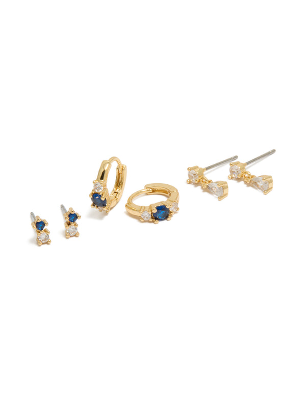 Beautifully arranged mini earrings 3-pack in gold plated crystal with mixed cut blue cubic zirconia and huggie closure front view