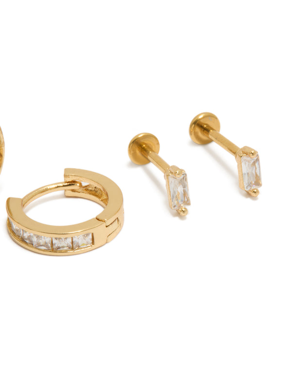 Featuring dainty flat back studs and hoops pack in gold plated titanium with baguette cut cubic zirconia crystal close up view