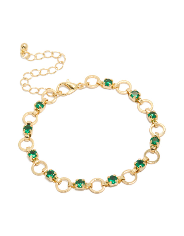 Showcasing a gold plated alternating round green cubic zirconia link bracelet front view