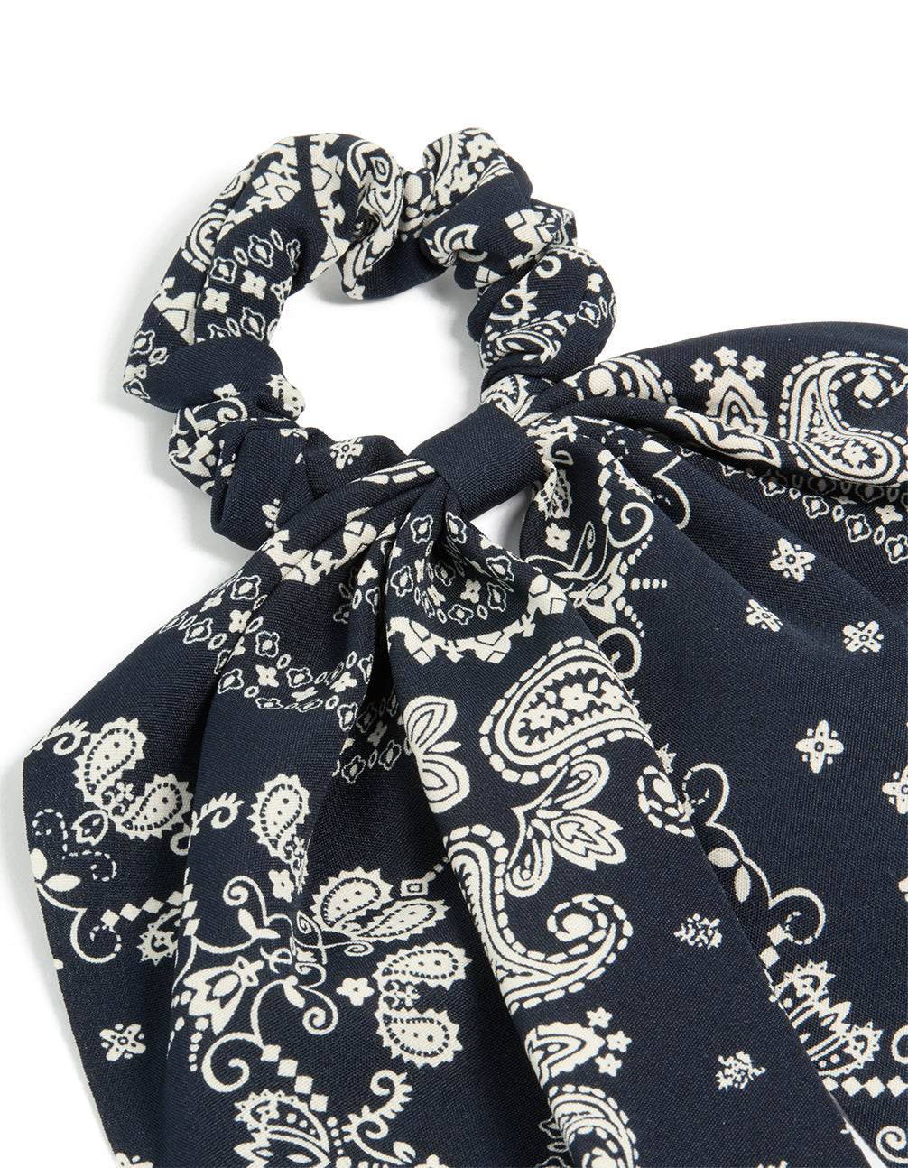 This paisley printed scarf scrunchie comes in black and ivory with statement design side view
